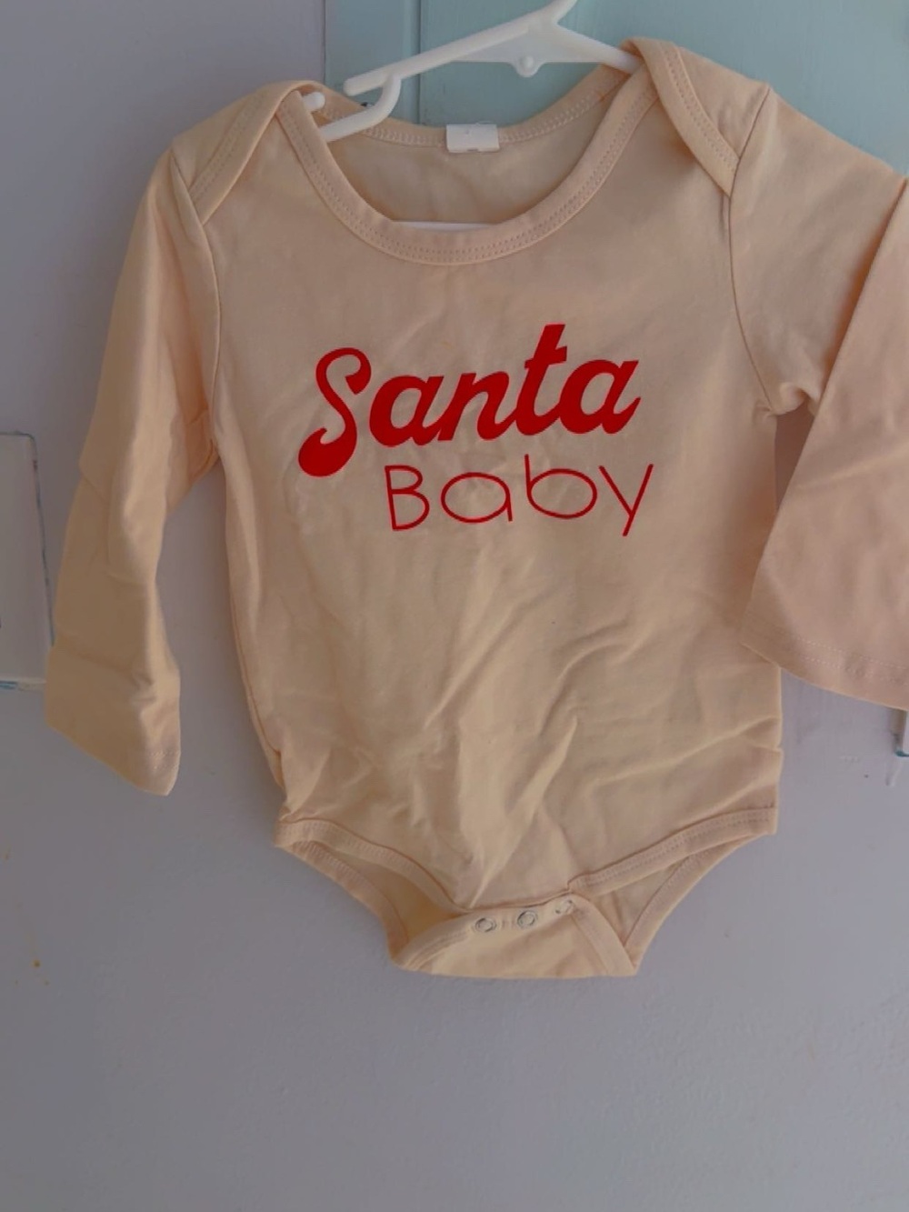 Santa Baby Long-Sleeve One-Piece Bodysuit in Cream